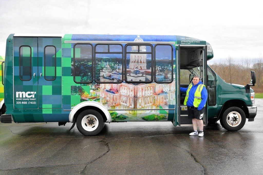 Miami County Ohio Transit bus wrap featuring the Courthouse